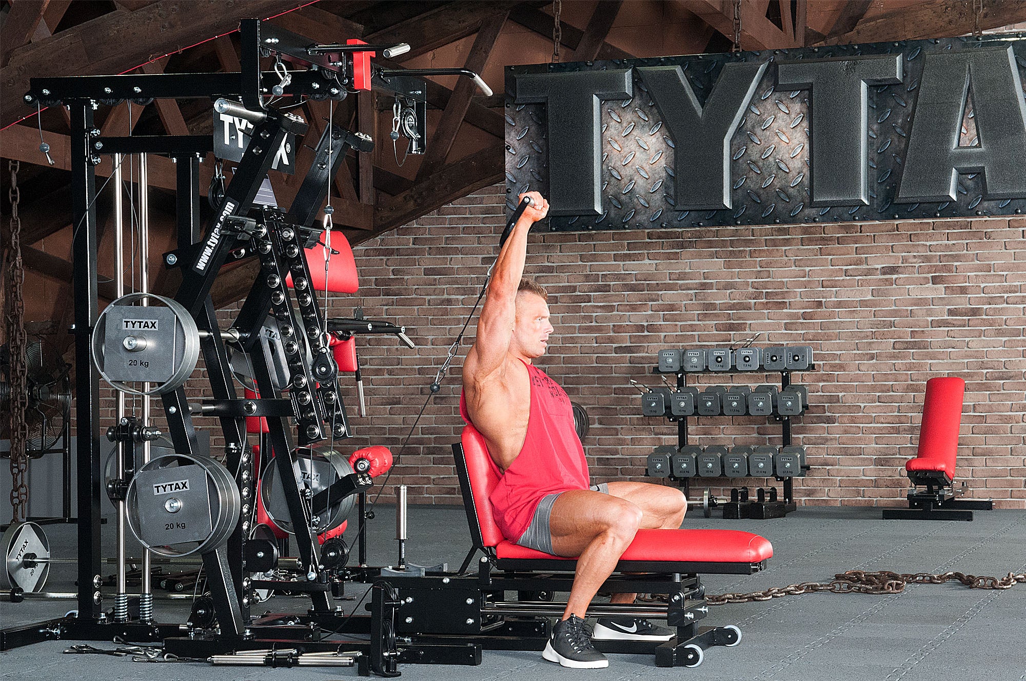 Einarmiges Kabelzug-Schulterdrücken sitzend